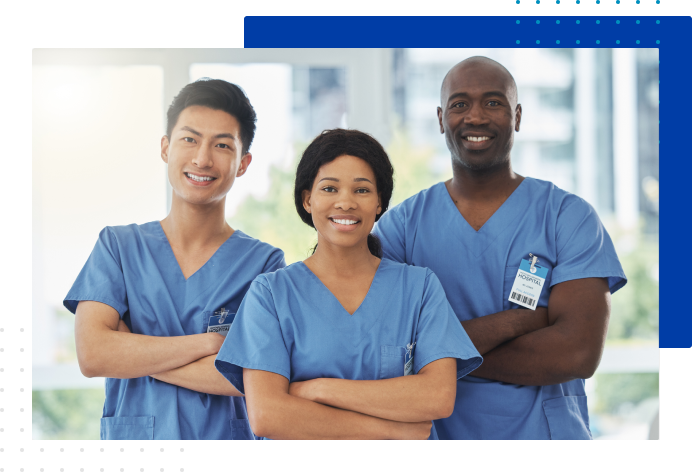 Team of three health care employees smiling  