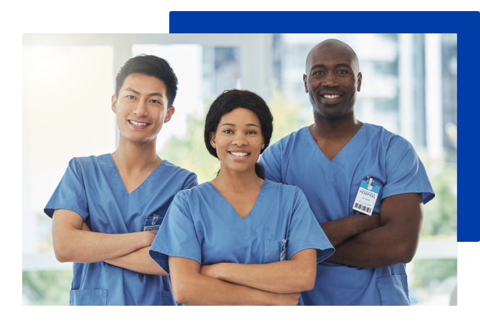 Team of three health care employees smiling  