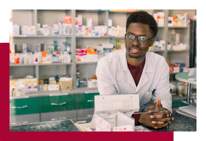 Smiling person working in a pharmacy